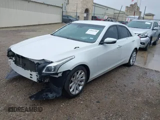 2015 Cadillac CTS Luxury RWD z VIN 1G6AR5S32F0123986, wystawiony jako IAAI lot #41853734 z przebiegiem 108 043 mil mil oraz . Historia ofert i sprzedaży dostępna na DreamBid. Obrazek 17.
