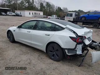 2023 Tesla Model 3 Long Range with VIN 5YJ3E1EB9PF393622, listed as a IAAI auction lot 41207132 with 14,097 mi miles and . Bid and sale history available at DreamBid. Image 3.
