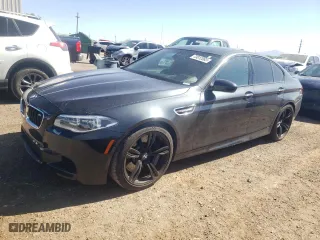 2016 BMW M5 with VIN WBSFV9C52GG343118, listed as a Copart auction lot 73812083 with 113,639 mi miles. Bid and sale history available at carsss.com. Image 1.