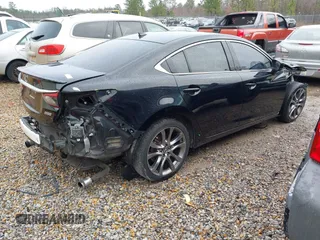 2017 Mazda 6 Grand Touring with VIN JM1GL1X54H1131788, listed as a IAAI auction lot 41640785 with 181,561 mi miles. Bid and sale history available at carsss.com. Image 4.