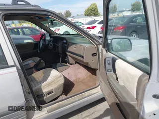 1994 Jeep Grand Cherokee Laredo with VIN 1J4GZ58YXRC325868, listed as a IAAI auction lot 42664900 with 220,149 mi miles and . Bid and sale history available at DreamBid. Image 5.