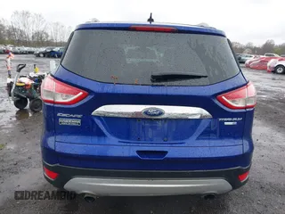 2014 Ford Escape Titanium with VIN 1FMCU9J99EUA46103, listed as a IAAI auction lot 42018097 with 169,878 mi miles and . Bid and sale history available at DreamBid. Image 16.