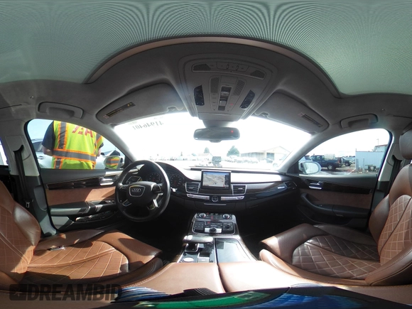 2015 Audi A8 4.0T with VIN WAU32AFD6FN039739, listed as a IAAI auction lot 41946401 with 102,668 mi miles and . Bid and sale history available at DreamBid. Image 18.