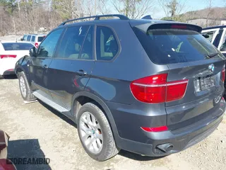 2011 BMW X5 35i with VIN 5UXZV4C51BL740731, listed as a IAAI auction lot 41771257 with 148,638 mi miles. Bid and sale history available at carsss.com. Image 3.
