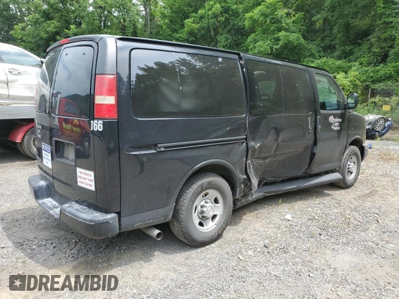 2015 Chevrolet Express Passenger LS with VIN 1GAWGPFG0F1141701, listed as a Copart auction lot 62818685 with 63,219 mi miles and Salvage title. Bid and sale history available at DreamBid. Image 3.
