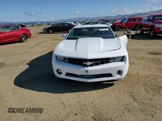 2013 Chevrolet Camaro LS z VIN 2G1FA1E39D9137510, wystawiony jako Copart lot #56770245 z przebiegiem 139 309 mil mil oraz Szkoda całkowita • Salvage title. Historia ofert i sprzedaży dostępna na DreamBid. Obrazek 13.