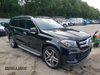 2017 Mercedes-Benz GLS with VIN 4JGDF7DE1HA857668, listed as a Copart auction lot 57278323 with 128,492 mi miles. Bid and sale history available at carsss.com. Image 4.