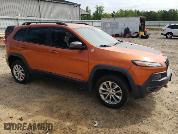 2015 Jeep Cherokee Trailhawk with VIN 1C4PJMBB5FW600455, listed as a Copart auction lot 53859365 with 164,420 mi miles and Salvage Title. Bid and sale history available at DreamBid. Image 4.