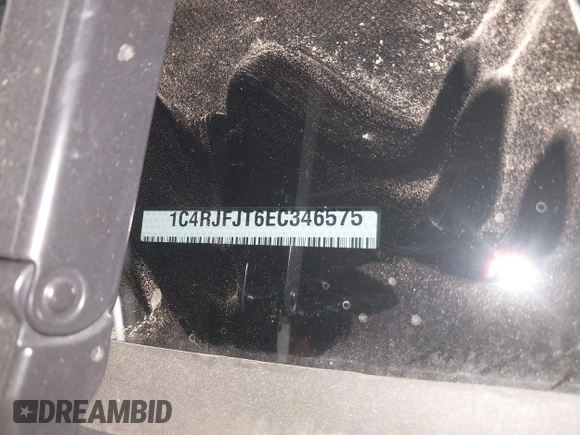 2014 Jeep Grand Cherokee Summit with VIN 1C4RJFJT6EC346575, listed as a IAAI auction lot 41881795 with 148,941 mi miles and . Bid and sale history available at DreamBid. Image 9.
