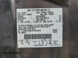 2005 Ford F-150 STX z VIN 1FTRX12W45FA04955, wystawiony jako Copart lot #54565015 z przebiegiem 189 505 mil mil oraz Szkoda całkowita • Salvage title. Historia ofert i sprzedaży dostępna na DreamBid. Obrazek 12.