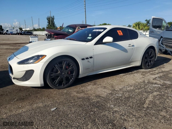 2015 Maserati GranTurismo MC with VIN ZAM45VLA5F0152820, listed as a Copart auction lot 64571614 with 0 mi miles and Salvage Title. Bid and sale history available at carsss.com. Image 1.