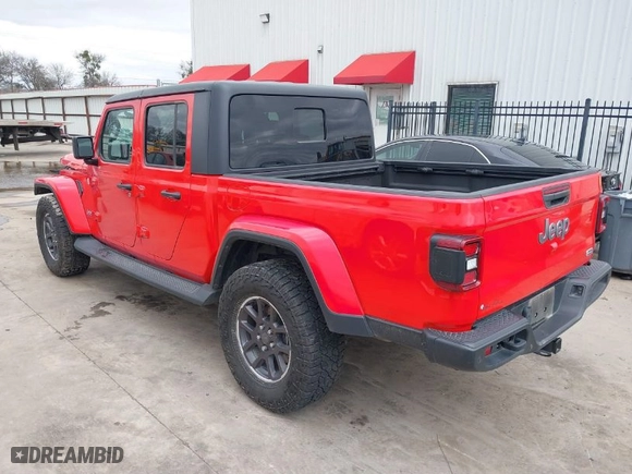 2022 Jeep Gladiator High Altitude with VIN 1C6HJTFG0NL105043, listed as a IAAI auction lot 41290790 with 73,595 mi miles. Bid and sale history available at carsss.com. Image 3.