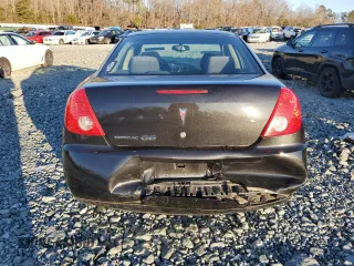 2009 Pontiac G6 1SA z VIN 1G2ZG57B794157106, wystawiony jako Copart lot #87292644 z przebiegiem Nie podano mil oraz Szkody całkowita. Historia ofert i sprzedaży dostępna na DreamBid. Obrazek 6.