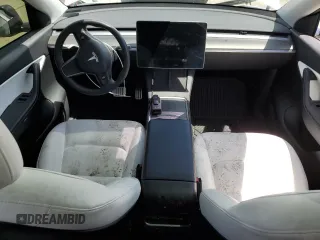 2022 Tesla Model Y Performance z VIN 7SAYGDEF6NF397082, wystawiony jako Copart lot #55823435 z przebiegiem Nie podano mil oraz Szkoda całkowita • Salvage title. Historia ofert i sprzedaży dostępna na DreamBid. Obrazek 8.