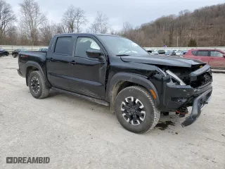 2023 Nissan Frontier PRO-4X with VIN 1N6ED1EK8PN619479, listed as a Copart auction lot 48434065 with 9,731 mi miles and Salvage Title. Bid and sale history available at carsss.com. Image 4.