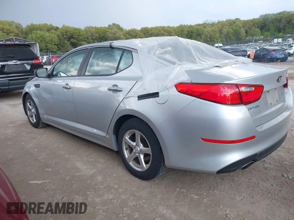 2014 Kia Optima LX with VIN 5XXGM4A71EG337837, listed as a IAAI auction lot 42251696 with 115,063 mi miles and . Bid and sale history available at DreamBid. Image 3.