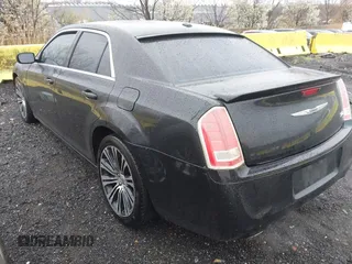 2013 Chrysler 300 with VIN 2C3CCABG1DH707991, listed as a IAAI auction lot 41983356 with 162,846 mi miles. Bid and sale history available at carsss.com. Image 3.