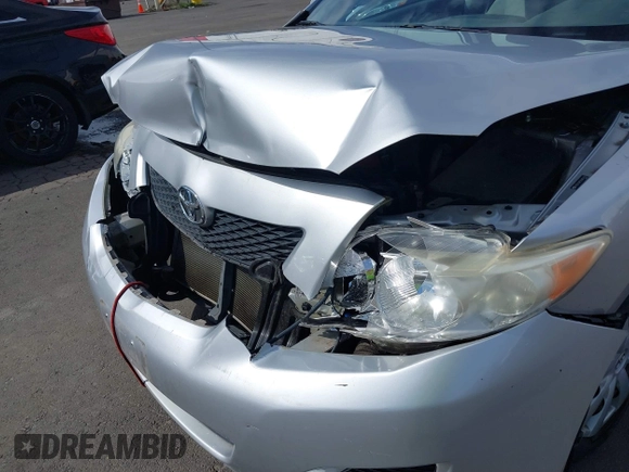 2009 Toyota Corolla with VIN JTDBL40E59J051651, listed as a IAAI auction lot 41874710 with 52,938 mi miles. Bid and sale history available at carsss.com. Image 6.