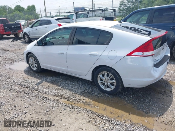 2010 Honda Insight EX z VIN JHMZE2H7XAS009007, wystawiony jako IAAI lot #42480220 z przebiegiem 158 379 mil mil oraz . Historia ofert i sprzedaży dostępna na DreamBid. Obrazek 3.