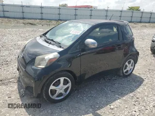 2014 Scion iQ with VIN JTNJJXB07EJ028558, listed as a Copart auction lot 64745345 with 112,221 mi miles and Clean title. Bid and sale history available at DreamBid. Image 1.