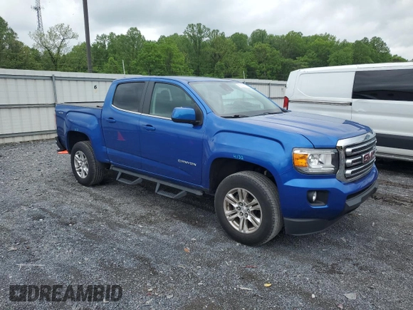 2019 GMC Canyon 4WD SLE z VIN 1GTG6CEN1K1206640, wystawiony jako Copart lot #55339285 z przebiegiem 52 166 mil mil oraz Szkody całkowita. Historia ofert i sprzedaży dostępna na DreamBid. Obrazek 4.