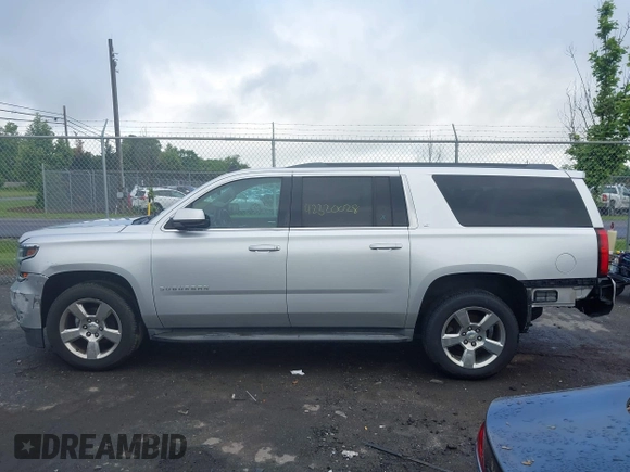 2015 Chevrolet Suburban LT z VIN 1GNSCJKC2FR144528, wystawiony jako IAAI lot #42320028 z przebiegiem 226 076 mil mil oraz . Historia ofert i sprzedaży dostępna na DreamBid. Obrazek 14.