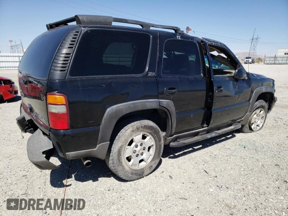 2002 Chevrolet Tahoe LT z VIN 1GNEK13T42R152851, wystawiony jako Copart lot #67958403 z przebiegiem 257 989 mil mil oraz Szkoda całkowita • Salvage title. Historia ofert i sprzedaży dostępna na DreamBid. Obrazek 3.