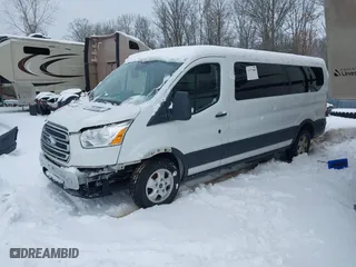 2018 Ford Transit Wagon XL with VIN 1FBZX2ZG2JKB04207, listed as a IAAI auction lot 41440996 with 126,256 mi miles. Bid and sale history available at carsss.com. Image 18.