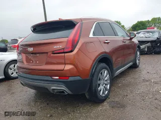 2019 Cadillac XT4 FWD Premium Luxury with VIN 1GYFZCR48KF208483, listed as a IAAI auction lot 41869450 with 65,318 mi miles. Bid and sale history available at carsss.com. Image 4.