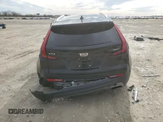 2022 Cadillac XT4 FWD Premium Luxury z VIN 1GYFZCR42NF135325, wystawiony jako Copart lot #43133215 z przebiegiem 48 998 mil mil oraz Szkoda całkowita • Salvage title. Historia ofert i sprzedaży dostępna na DreamBid. Obrazek 6.