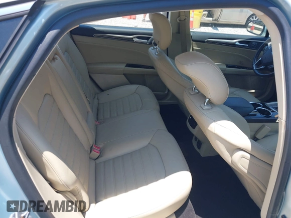 2013 Ford Fusion SE Hybrid z VIN 3FA6P0LU4DR259073, wystawiony jako IAAI lot #42197143 z przebiegiem 87 337 mil mil oraz . Historia ofert i sprzedaży dostępna na DreamBid. Obrazek 8.