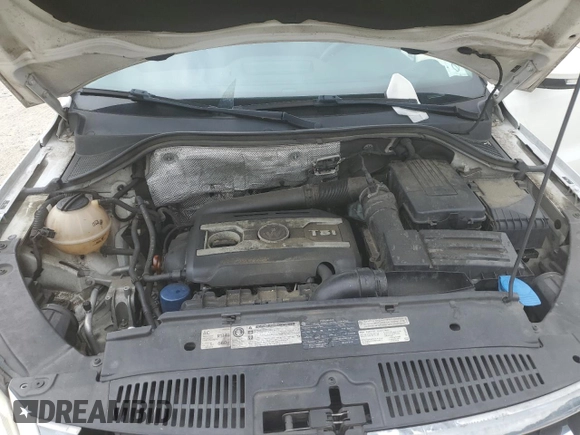 2011 Volkswagen Tiguan SE с VIN WVGBV7AX7BW560012, выставлен на аукционе Copart как лот 63031455 с пробегом 123 167 миль миль и Чистый • Clean title. История ставок и продаж доступна на DreamBid. Изображение 12.