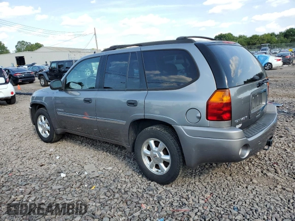 2006 GMC Envoy SLT with VIN 1GKDT13S962305588, listed as a Copart auction lot 69196964 with 118,289 mi miles and Salvage Title. Bid and sale history available at DreamBid. Image 2.