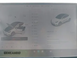 2023 Tesla Model Y Long Range with VIN 7SAYGAEEXPF776370, listed as a IAAI auction lot 42127512 with 27,120 mi miles and . Bid and sale history available at DreamBid. Image 19.