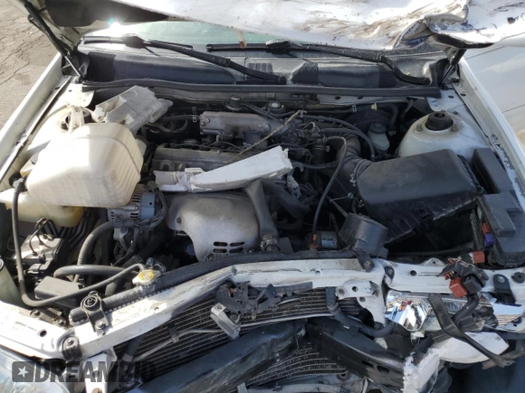 2000 Toyota Camry CE z VIN JT2BG22K2Y0479735, wystawiony jako Copart lot #50226755 z przebiegiem 282 694 mil mil oraz Nie do naprawy • Non repairable. Historia ofert i sprzedaży dostępna na DreamBid. Obrazek 12.