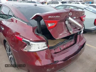 2016 Nissan Maxima SV with VIN 1N4AA6AP9GC410441, listed as a IAAI auction lot 41479069 with 74,252 mi miles and . Bid and sale history available at DreamBid. Image 6.