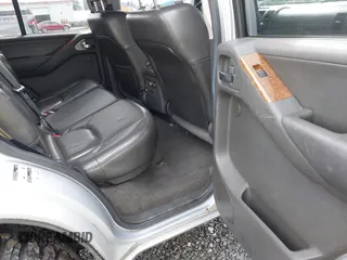 2005 Nissan Pathfinder SE z VIN 5N1AR18W35C790033, wystawiony jako IAAI lot #41949129 z przebiegiem 227 199 mil mil oraz . Historia ofert i sprzedaży dostępna na DreamBid. Obrazek 8.