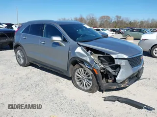 2024 Cadillac XT4 FWD Premium Luxury with VIN 1GYFZCR44RF130066, listed as a IAAI auction lot 41735148 with 32,157 mi miles and . Bid and sale history available at carsss.com. Image 1.