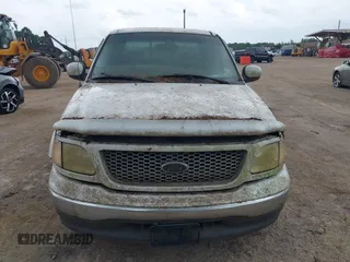 2001 Ford F-150 XLT with VIN 1FTRW07W41KA42743, listed as a IAAI auction lot 42605714 with 254,360 mi miles and . Bid and sale history available at DreamBid. Image 6.