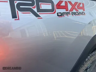 2019 Toyota Tacoma 4WD SR5 with VIN 5TFSZ5AN7KX210918, listed as a IAAI auction lot 42073480 with 169,742 mi miles. Bid and sale history available at carsss.com. Image 1.
