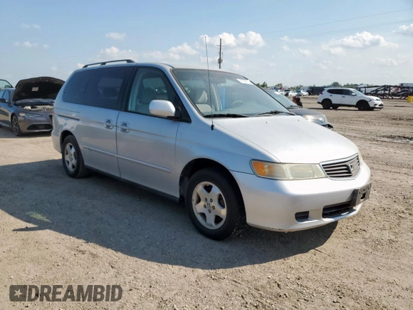 2001 Honda Odyssey EX with VIN 2HKRL18641H619203, listed as a Copart auction lot 59329555 with 180,058 mi miles and Clean title. Bid and sale history available at DreamBid. Image 4.