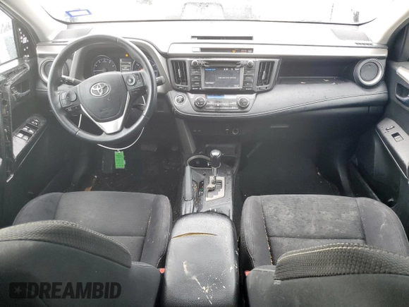 2018 Toyota RAV4 XLE with VIN 2T3WFREV6JW411935, listed as a Copart auction lot 54218405 with 123,831 mi miles and Salvage title. Bid and sale history available at DreamBid. Image 8.