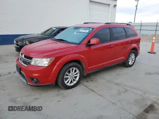 2013 Dodge Journey SXT with VIN 3C4PDDBG1DT593302, listed as a Copart auction lot 44517955 with 176,136 mi miles and Salvage title. Bid and sale history available at DreamBid. Image 1.
