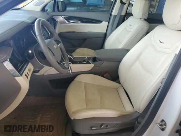 2023 Cadillac XT6 FWD Premium Luxury with VIN 1GYKPCRS4PZ103819, listed as a Copart auction lot 76279704 with 19,601 mi miles and Clean Title. Bid and sale history available at carsss.com. Image 7.