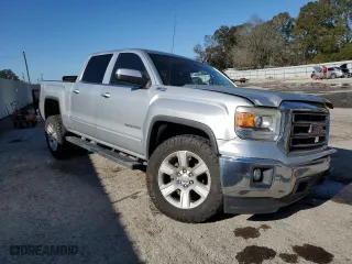 2015 GMC Sierra 1500 SLE with VIN 3GTU2UEC6FG170132, listed as a Copart auction lot 86053004 with 102,096 mi miles and Salvage Title. Bid and sale history available at carsss.com. Image 4.