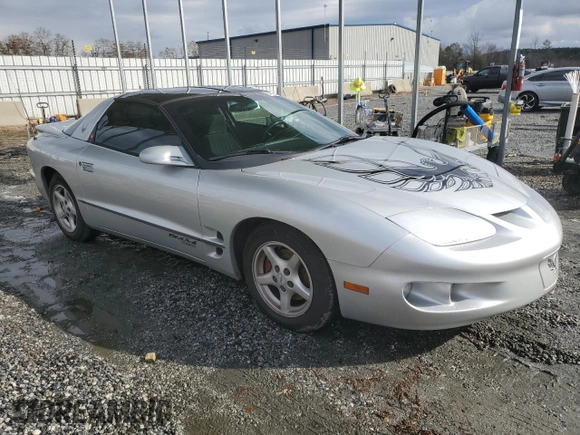 2002 Pontiac Firebird Firebird z VIN 2G2FS22K122146573, wystawiony jako Copart lot #84674224 z przebiegiem 156 932 mil mil oraz Szkoda całkowita • Salvage title. Historia ofert i sprzedaży dostępna na DreamBid. Obrazek 4.