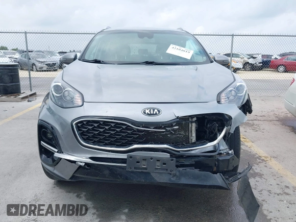 2020 Kia Sportage EX with VIN KNDPNCAC2L7791248, listed as a IAAI auction lot 42104819 with 73,324 mi miles and . Bid and sale history available at DreamBid. Image 6.