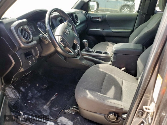 2017 Toyota Tacoma SR5 z VIN 5TFRZ5CNXHX025315, wystawiony jako Copart lot #57901395 z przebiegiem 158 197 mil mil oraz Szkoda całkowita • Salvage title. Historia ofert i sprzedaży dostępna na DreamBid. Obrazek 7.