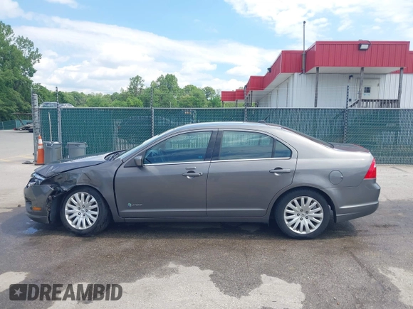 2011 Ford Fusion Hybrid with VIN 3FADP0L32BR132155, listed as a IAAI auction lot 42196233 with 77,900 mi miles and . Bid and sale history available at DreamBid. Image 14.