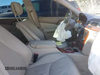 2002 Mercedes-Benz S-Class 4.3L with VIN WDBNG70J42A269648, listed as a IAAI auction lot 41634588 with 141,894 mi miles. Bid and sale history available at carsss.com. Image 5.